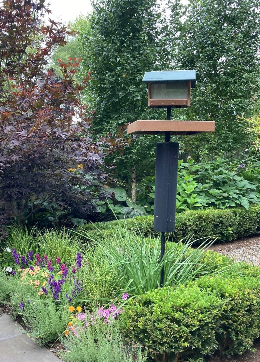 Birdhouse in garden bed